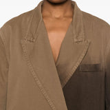 Brown jackets worn by a person, showing the jackets fit