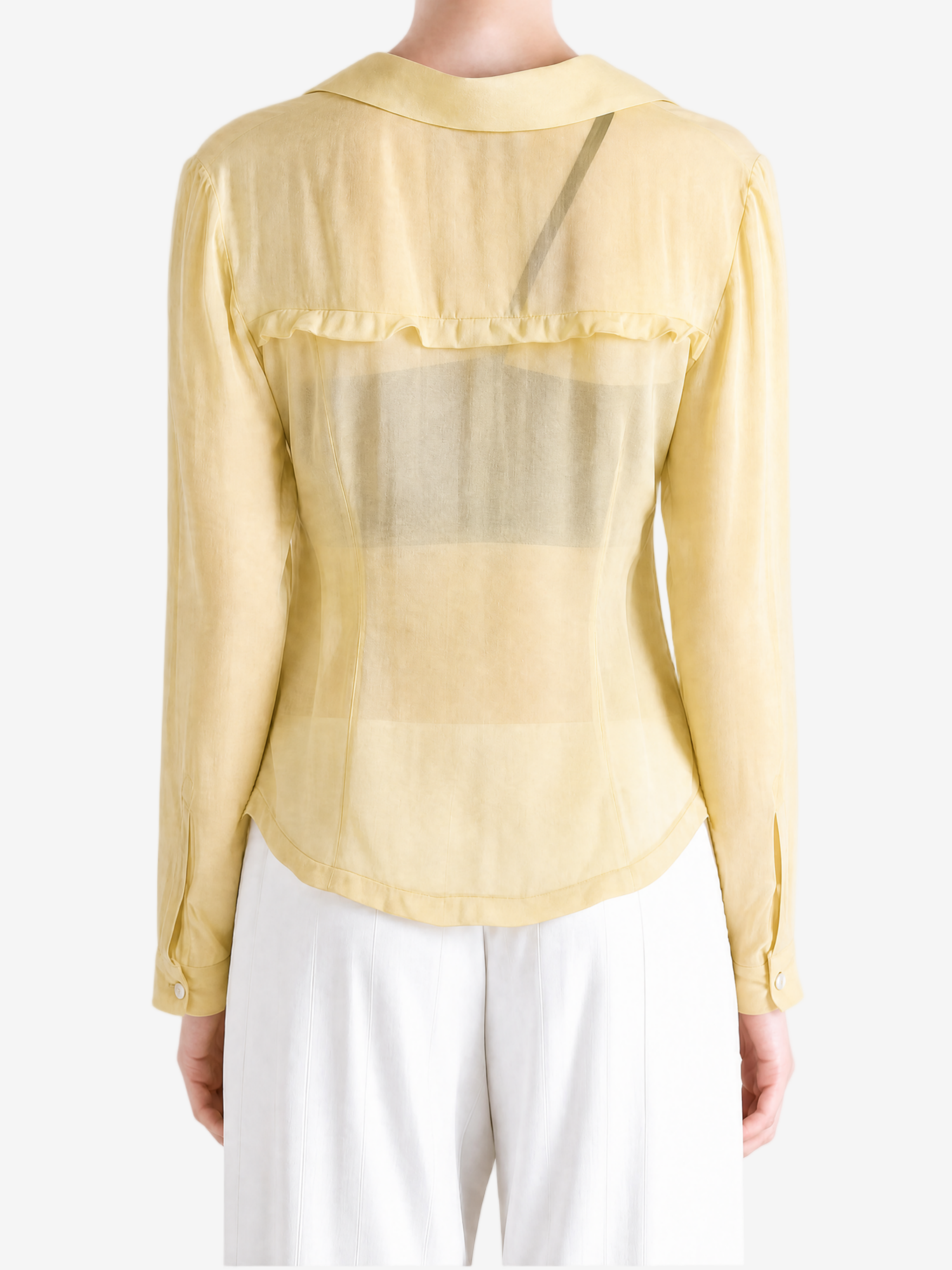 Tan shirt worn by a person, showing the shirt fit