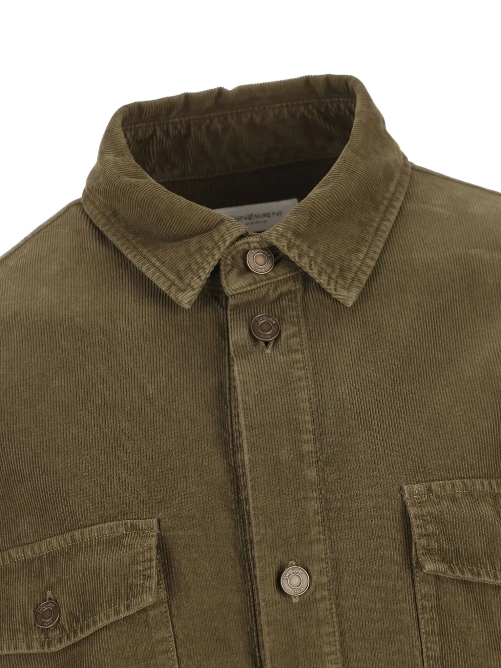 Close up of brown jacket,showing texture of the cotton fabric.