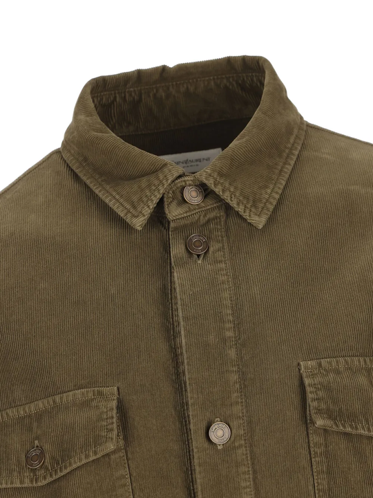Close up of brown jacket,showing texture of the cotton fabric.