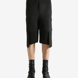 Black shorts worn by a perosn, showing the short's fit