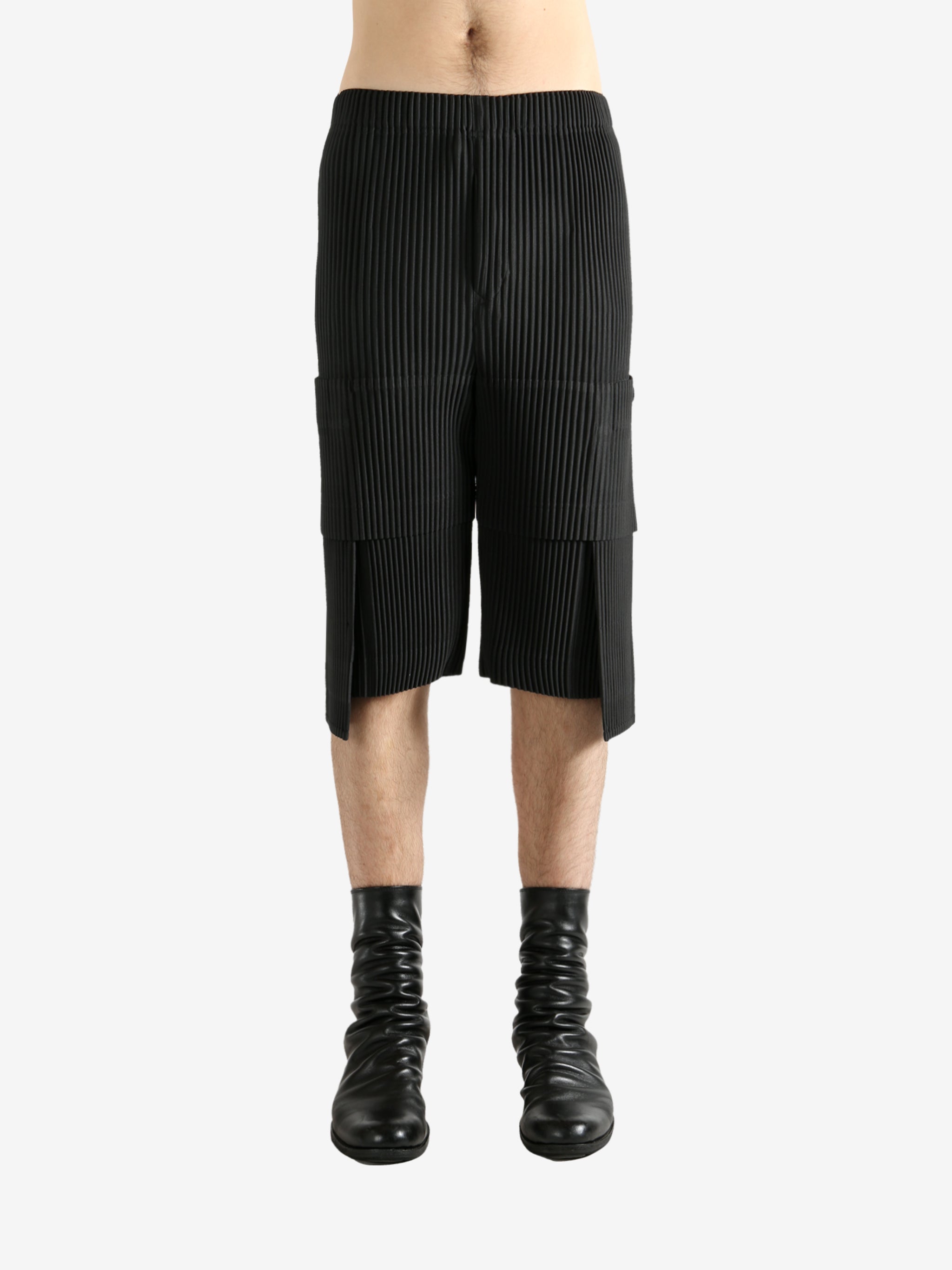 Black shorts worn by a perosn, showing the short's fit