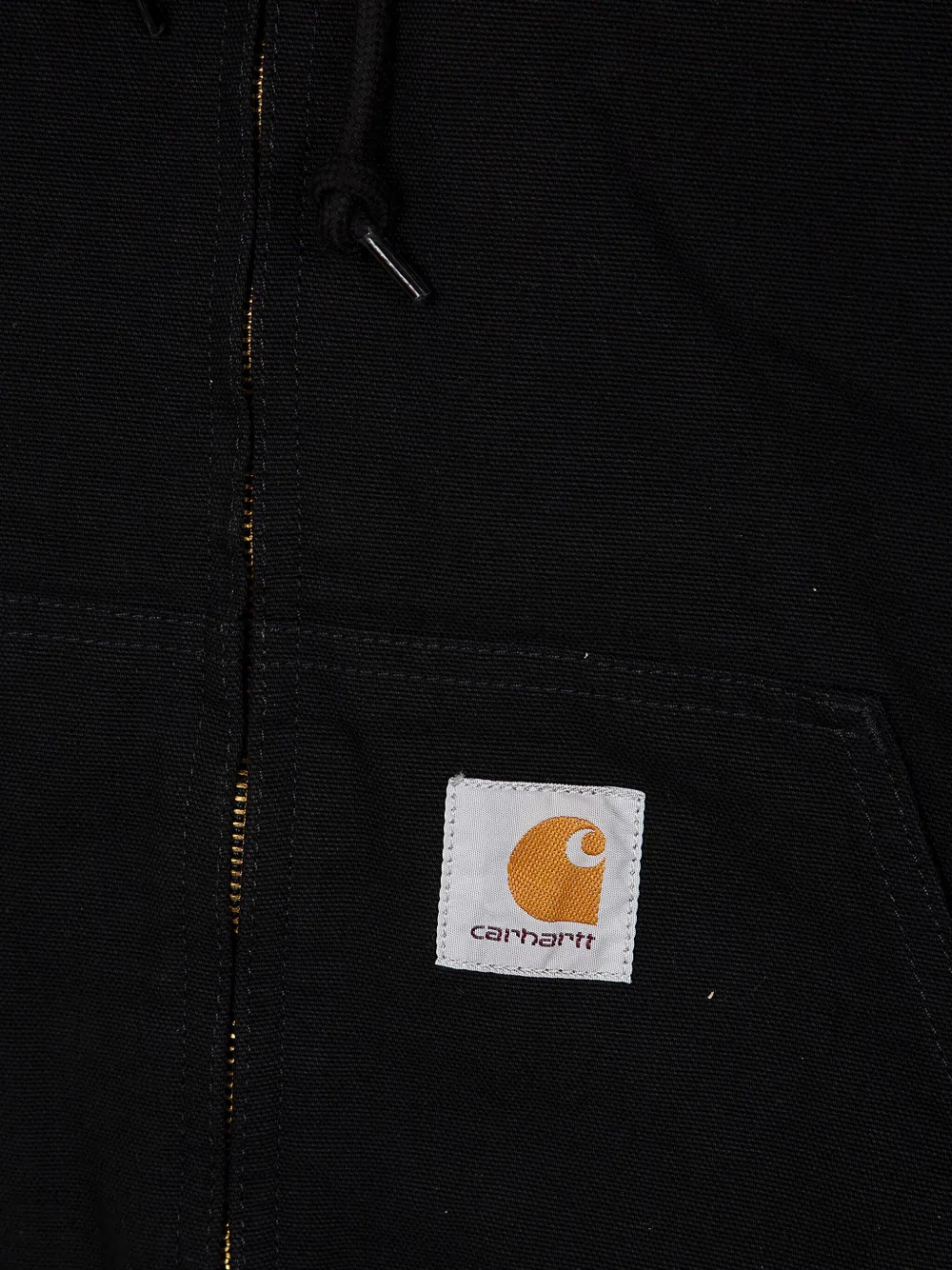 Close up of black hoodie,showing texture of the cotton fabric