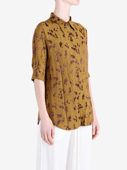 Yellow shirt worn by a person, showing the shirt fit