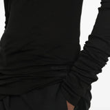 Black t-shirt worn by a person, showing the t-shirt fit