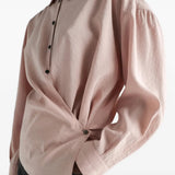 Pink dress worn by a person, showing the dress fit