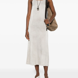 White dress worn by a person, showing the dress fit
