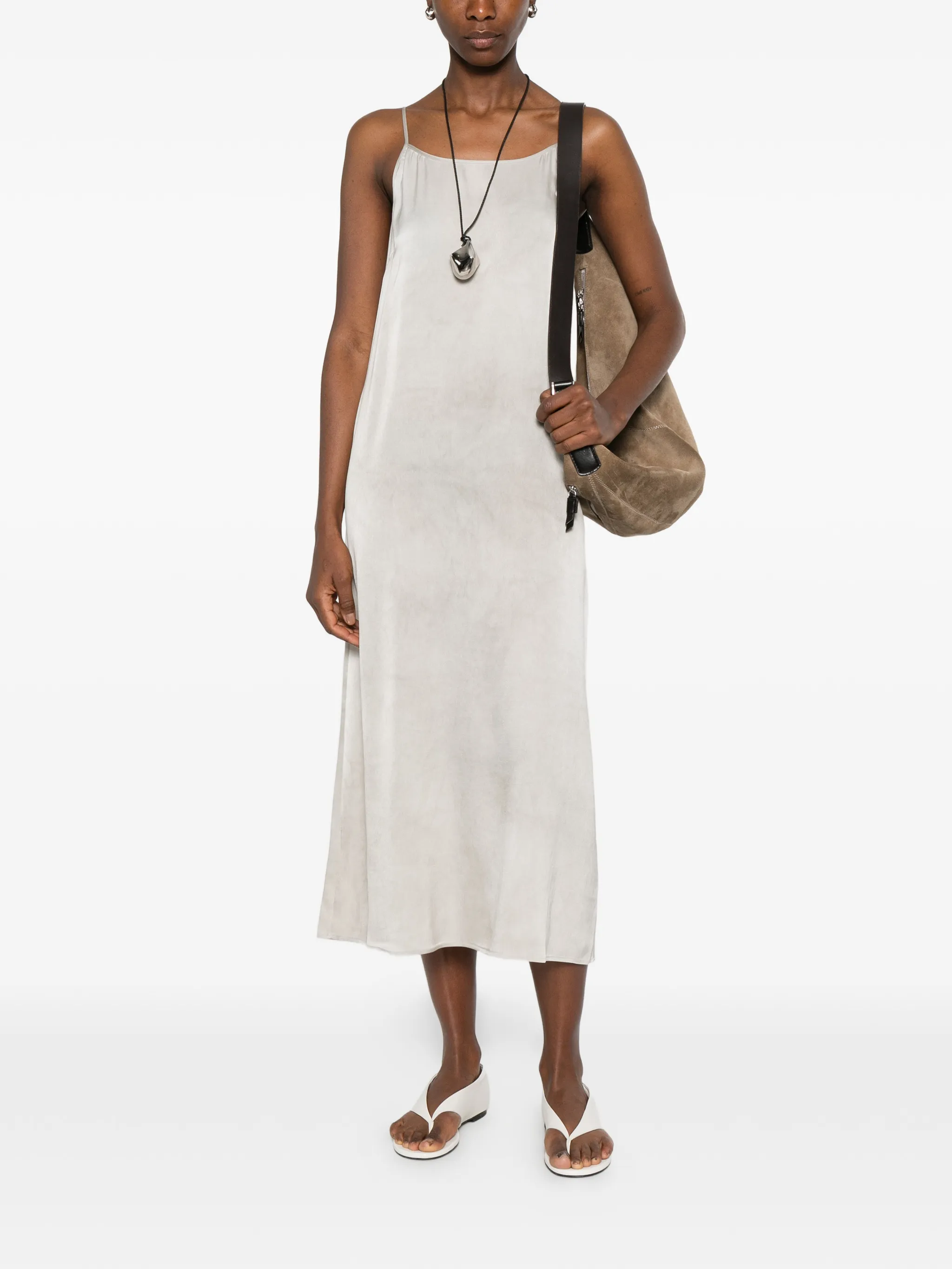 White dress worn by a person, showing the dress fit