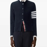 Navy cardigan worn by a person, showing the cardigan's fit