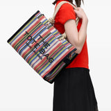 Red bag worn by a person, showing the bag's fit