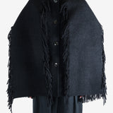 Black jacket worn by a person, showing the jacket's fit