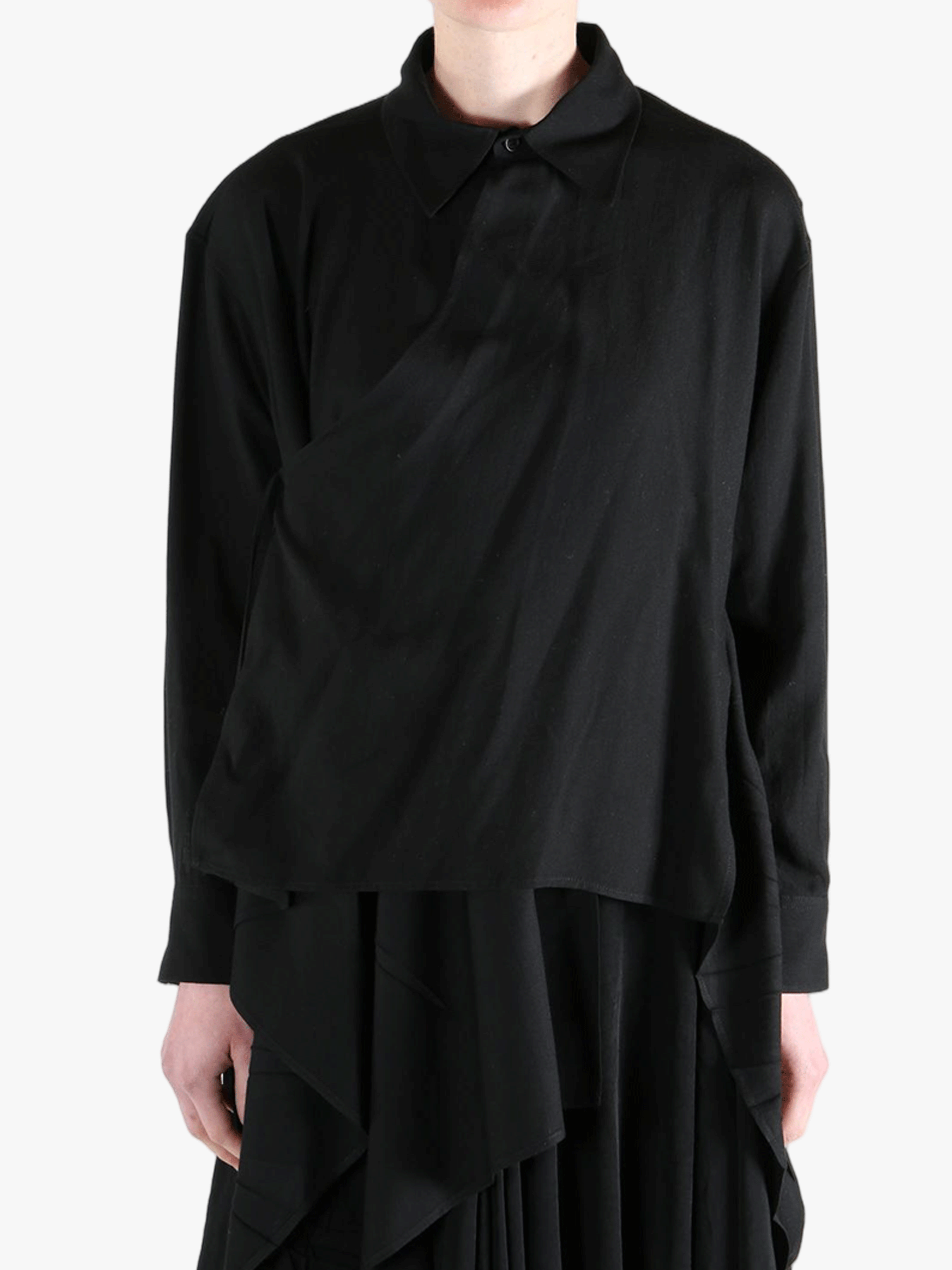 Black shirt worn by a person, showing the shirt's fit