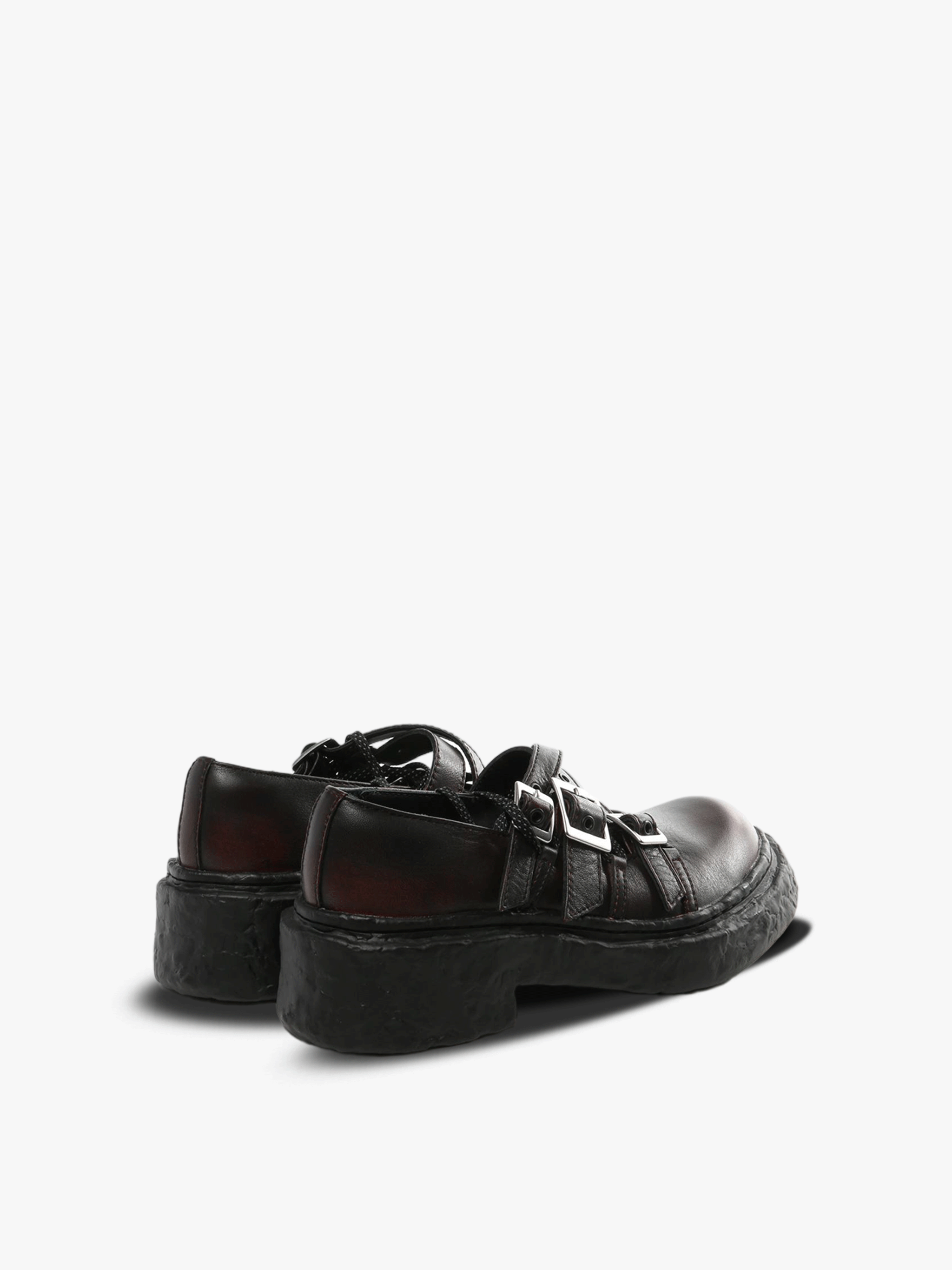 Brown loafers, side view