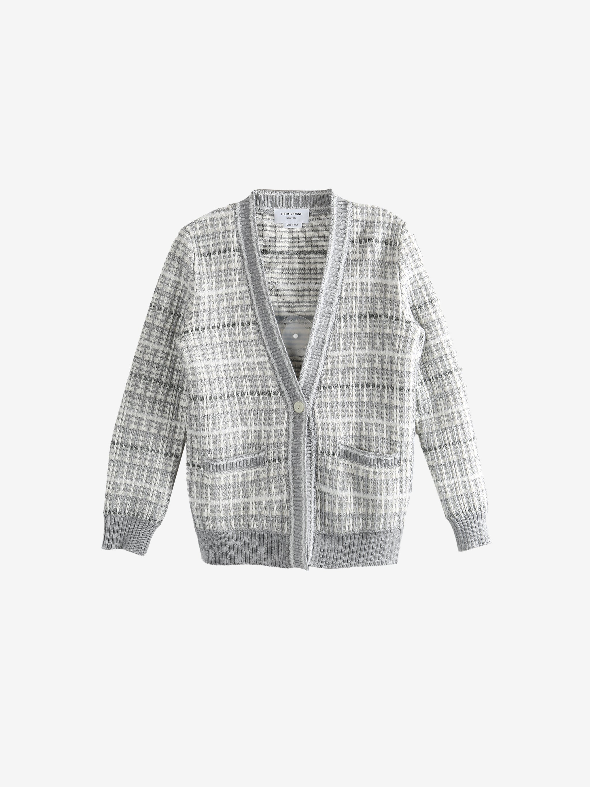 Grey knitwear, front view