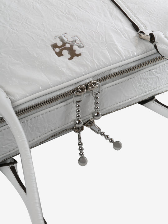 Close up of white bags, showing texture of the fabric