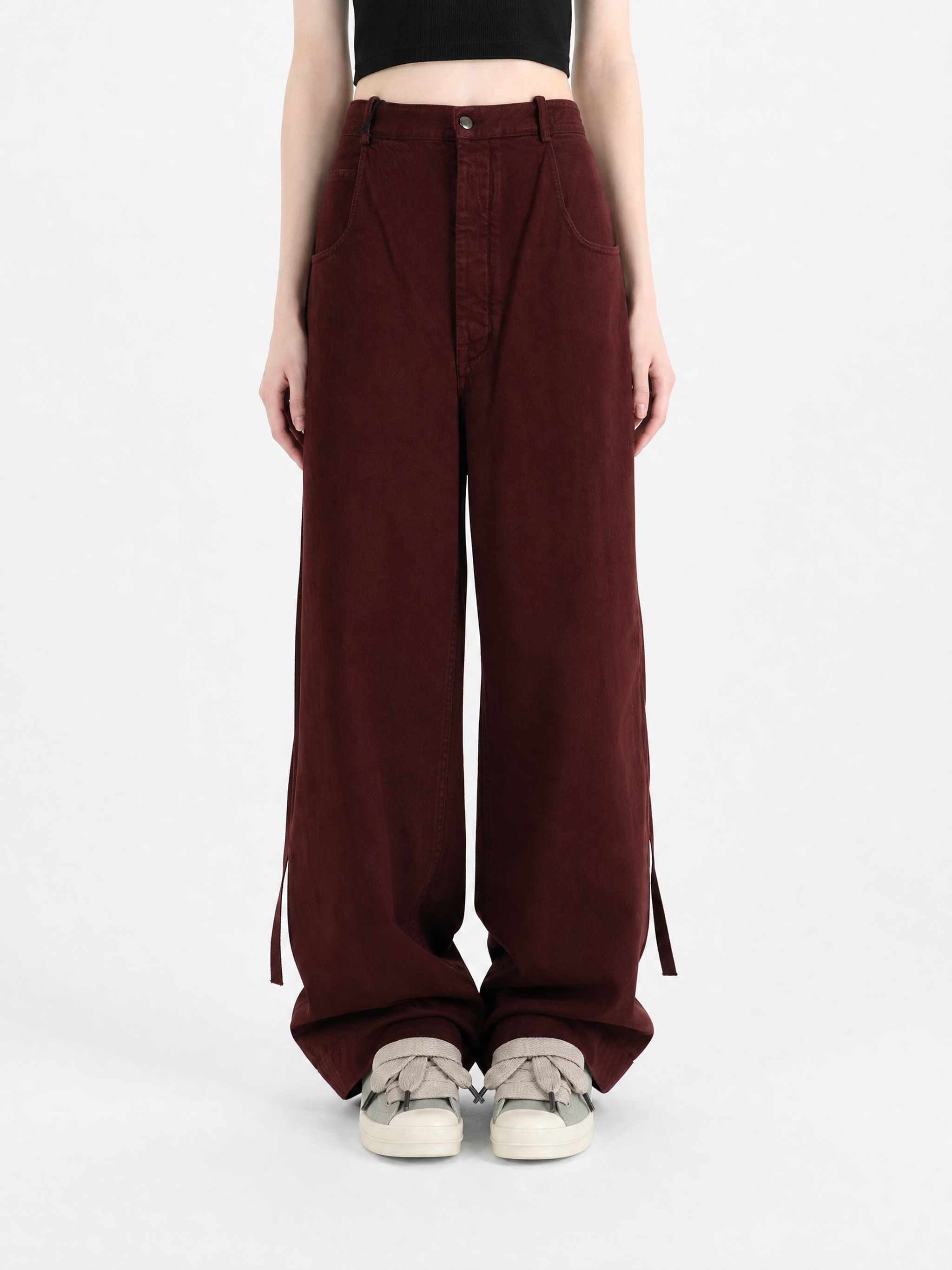 Burgundy pants, full body view