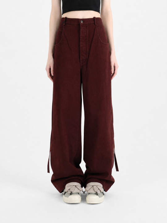 Burgundy pants, full body view