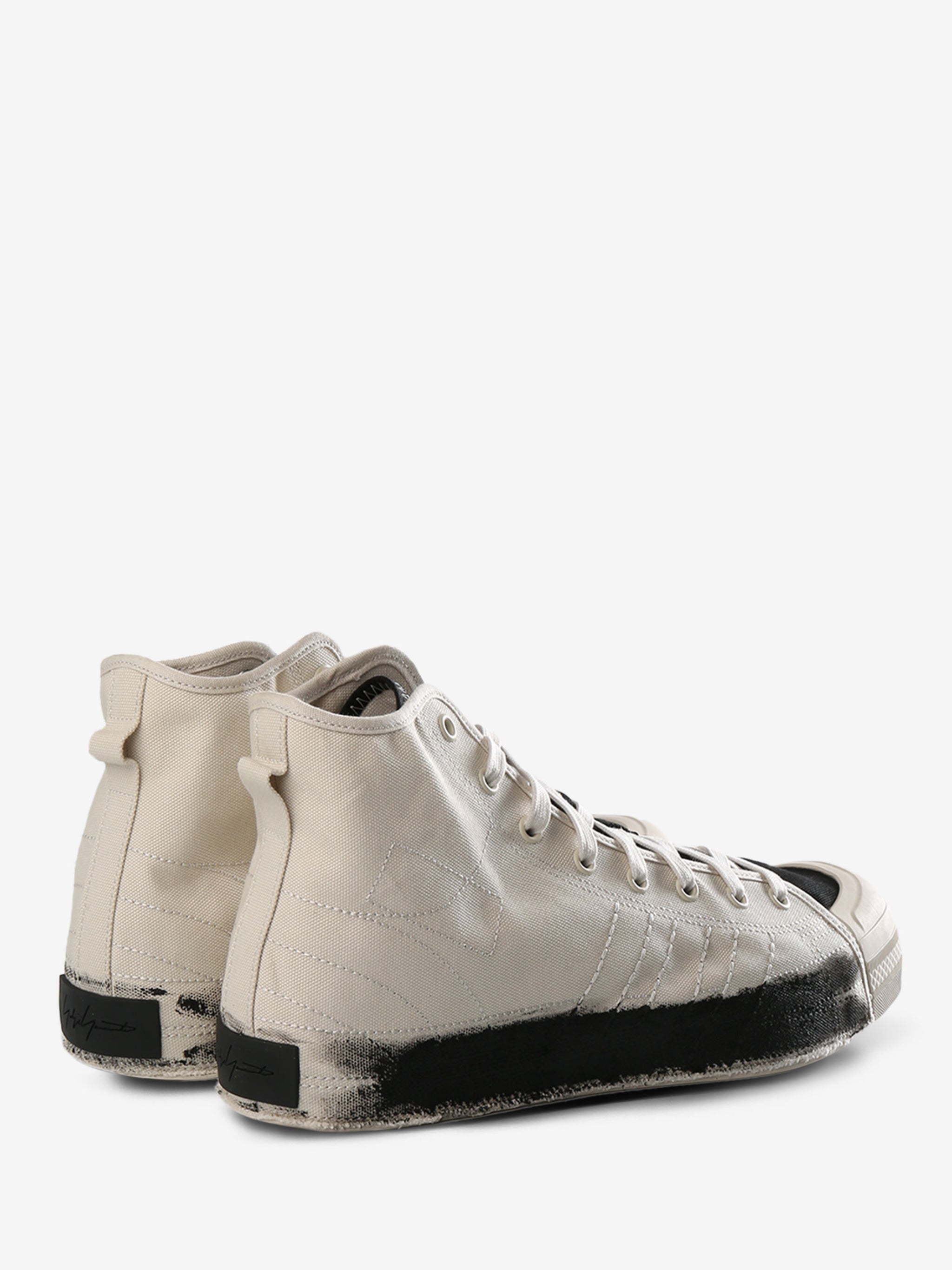 White sneaker, back view