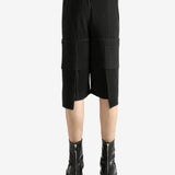 Black shorts worn by a perosn, showing the short's fit