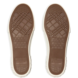  tan sneakers, bottom view