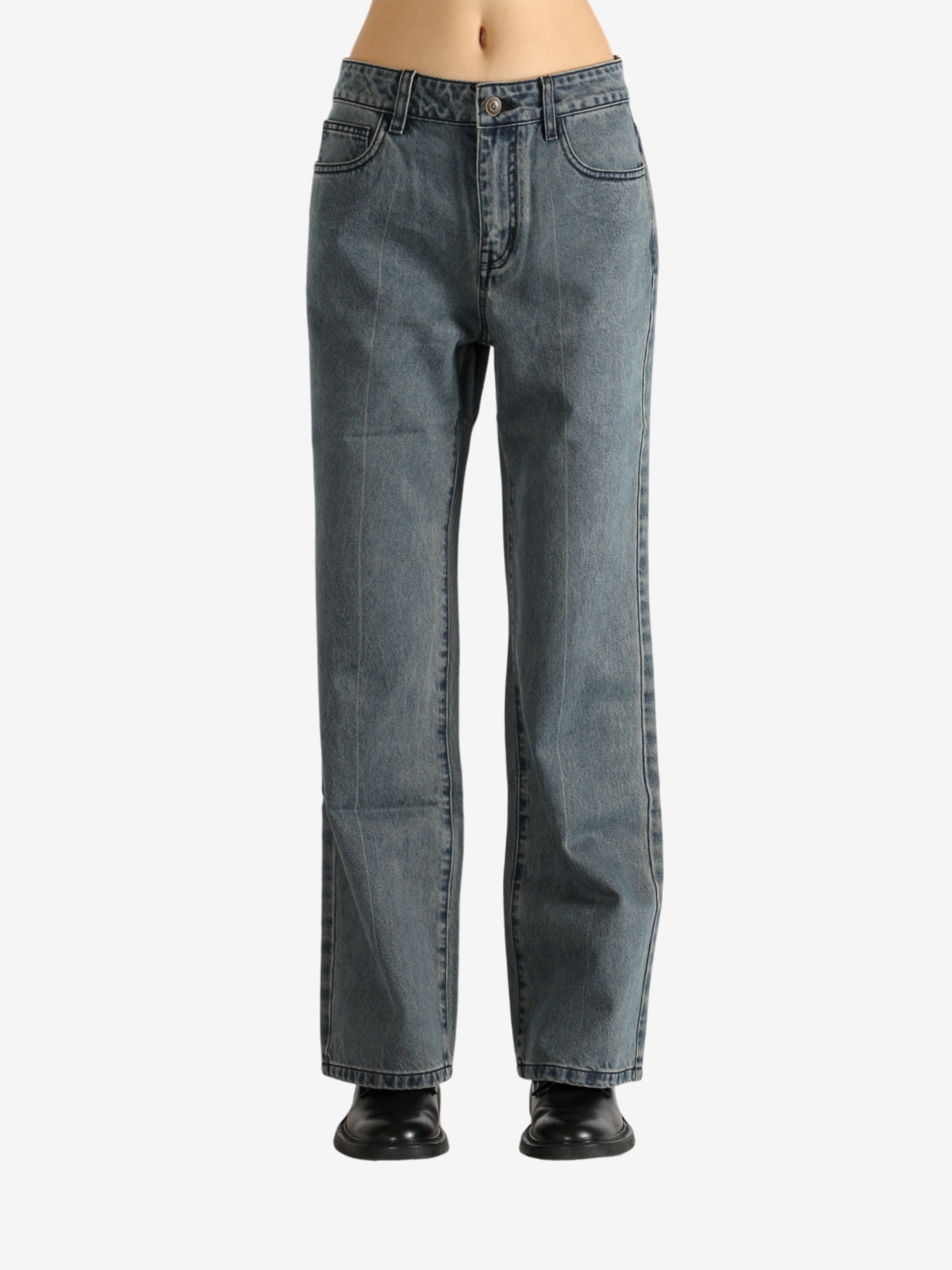 Blue pants worn by a person,showing the pants' fit