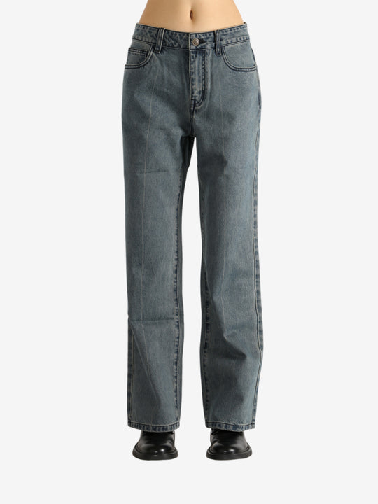 Blue pants worn by a person,showing the pants' fit