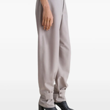 Black boots worn by a person, showing the boots' fit