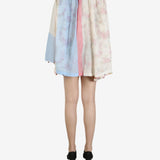 Tan shirt worn by a person, showing the shirt’s fit