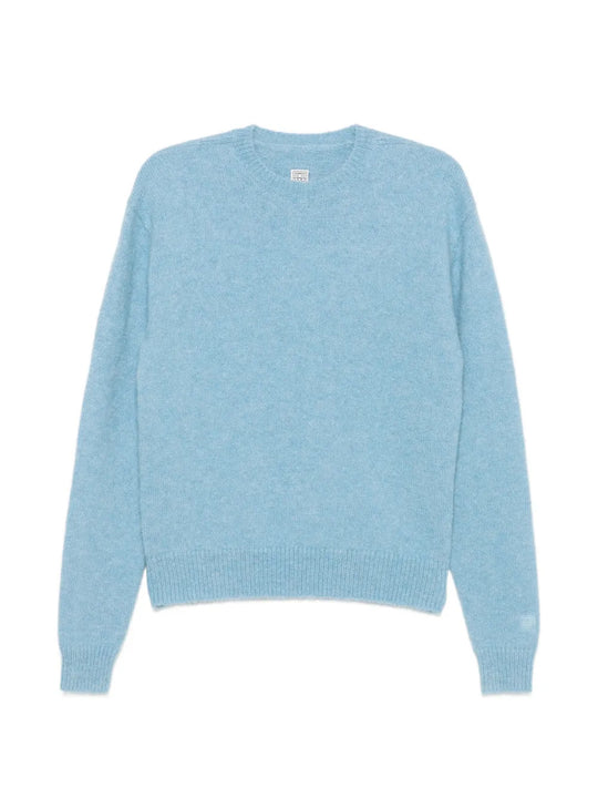 Blue knitwear, front view