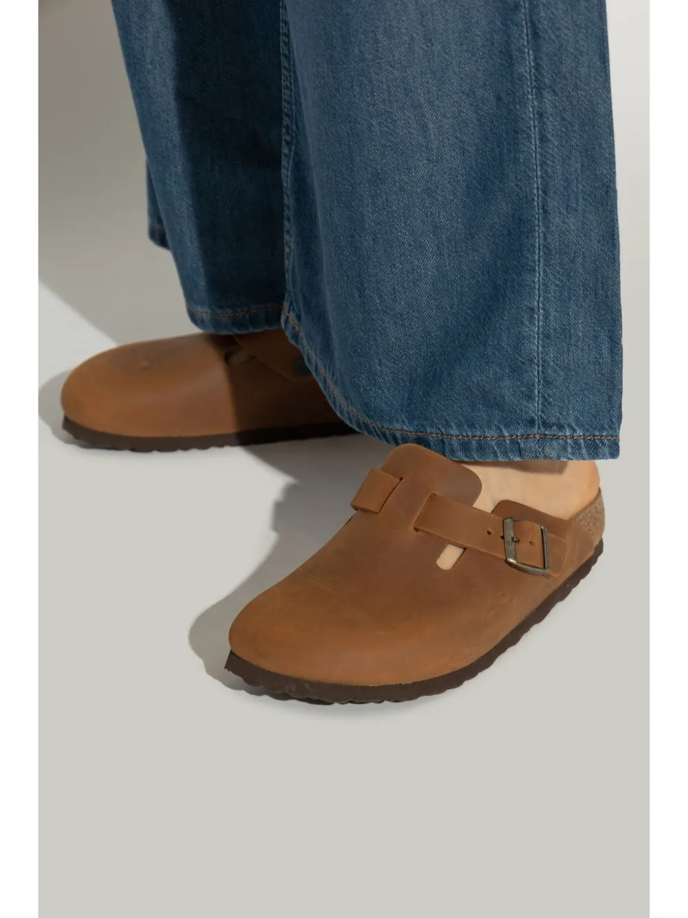 Brown shoes worn by a person, showing the shoes fit