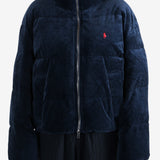 Navy coats worn by a person, showing the coats fit