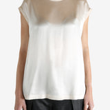 Grey t-shirts worn by a person, showing the t-shirts fit