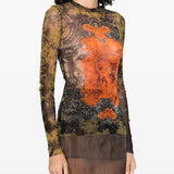 Black top worn by a person, showing the top fit