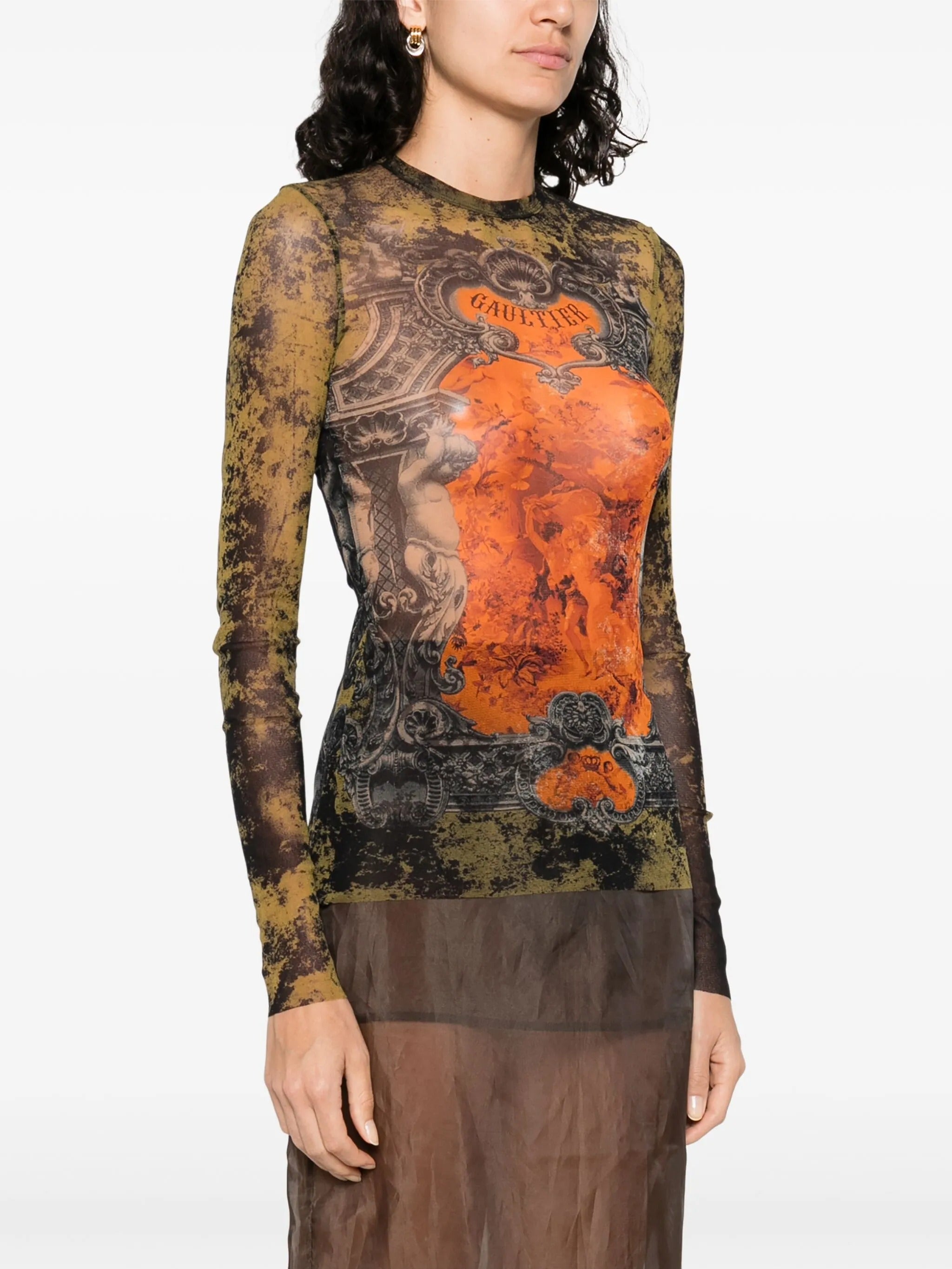 Black top worn by a person, showing the top fit