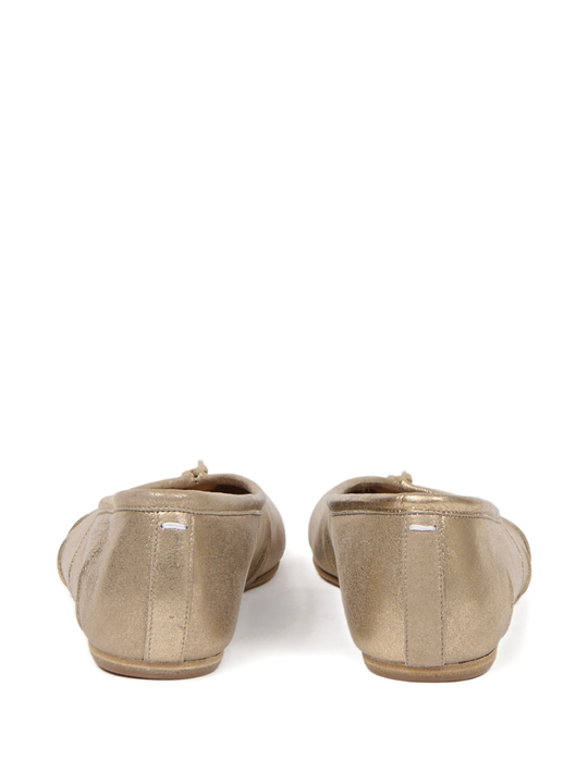 yellow flats, back view