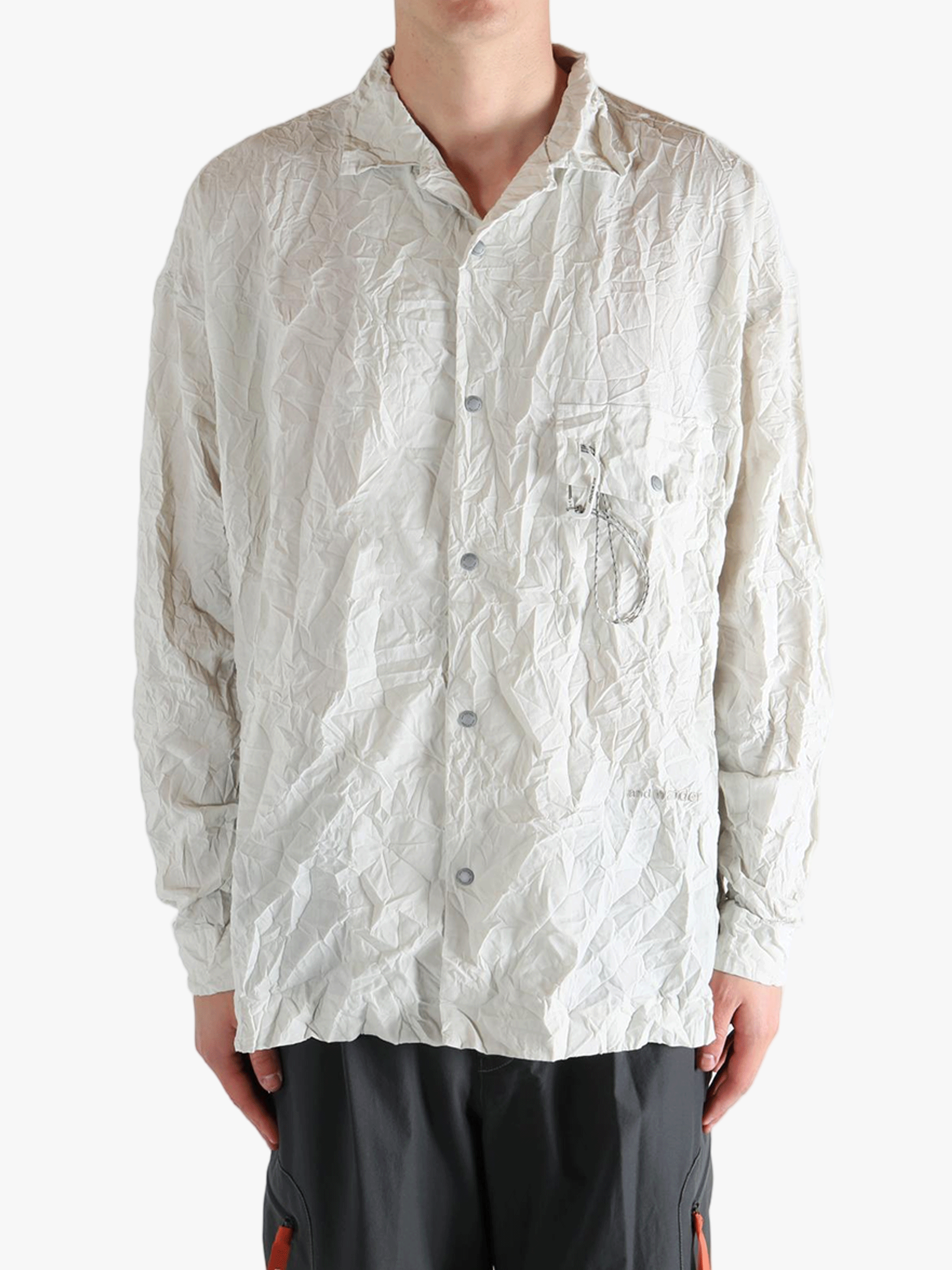 White shirts worn by a person, showing the shirts fit
