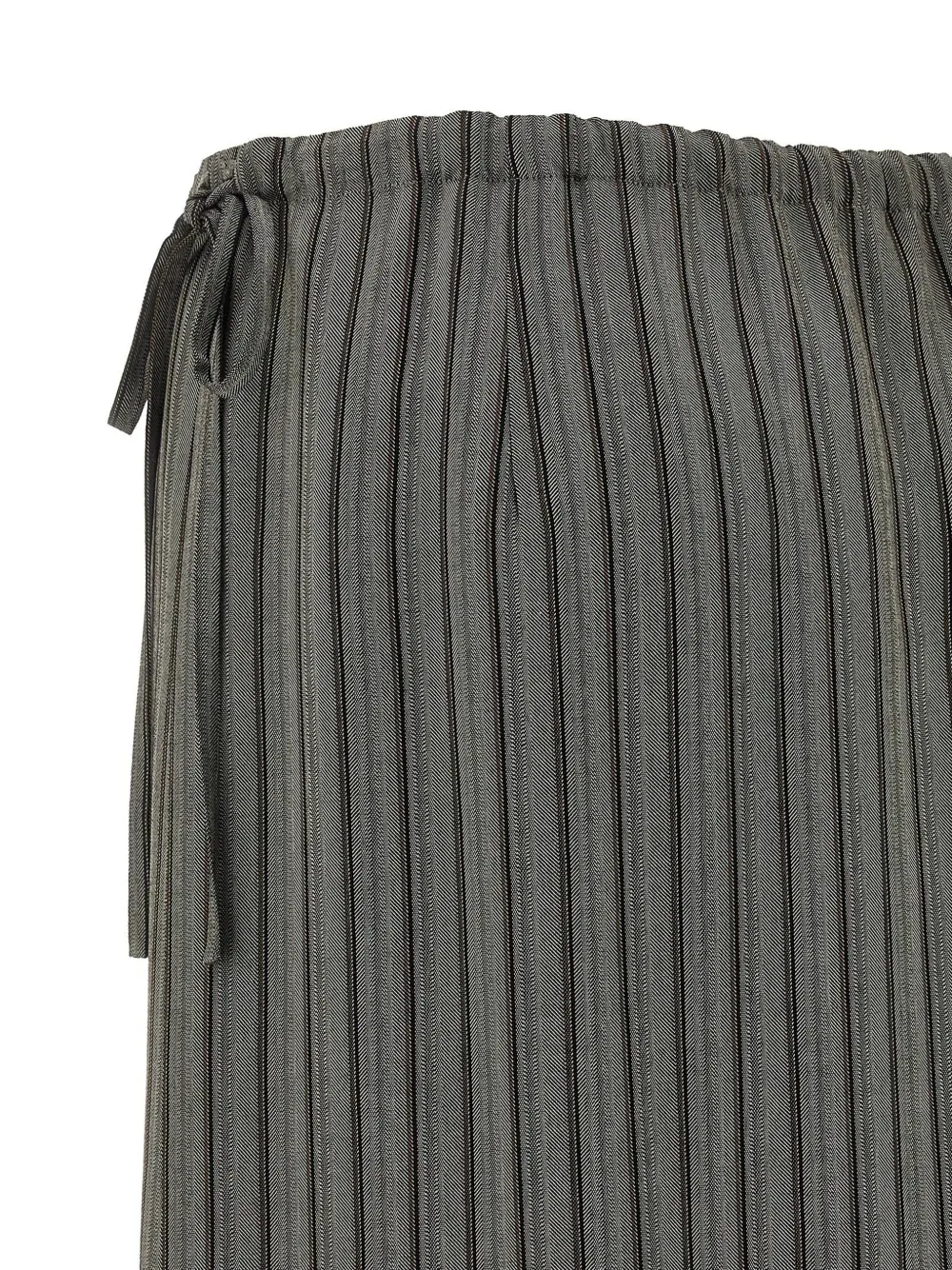 Close up of grey skirt, showing texture of the viscose fabric