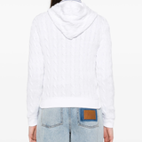 white shirt worn by a person, showing the shirt's fit
