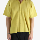 Yellow shirt worn by a person, showing the shirt's fit