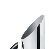 Close up of black pitcher, showing texture of the steel fabric