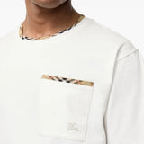 Tan t-shirt worn by a person, showing the t-shirt fit