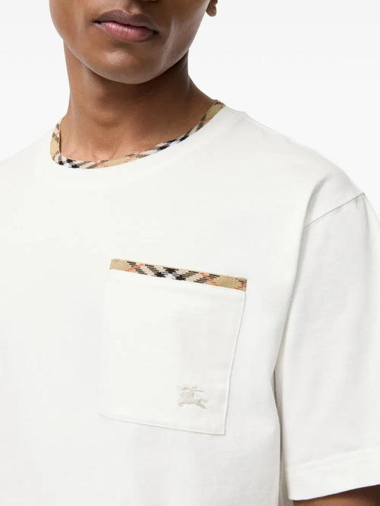 Tan t-shirt worn by a person, showing the t-shirt fit
