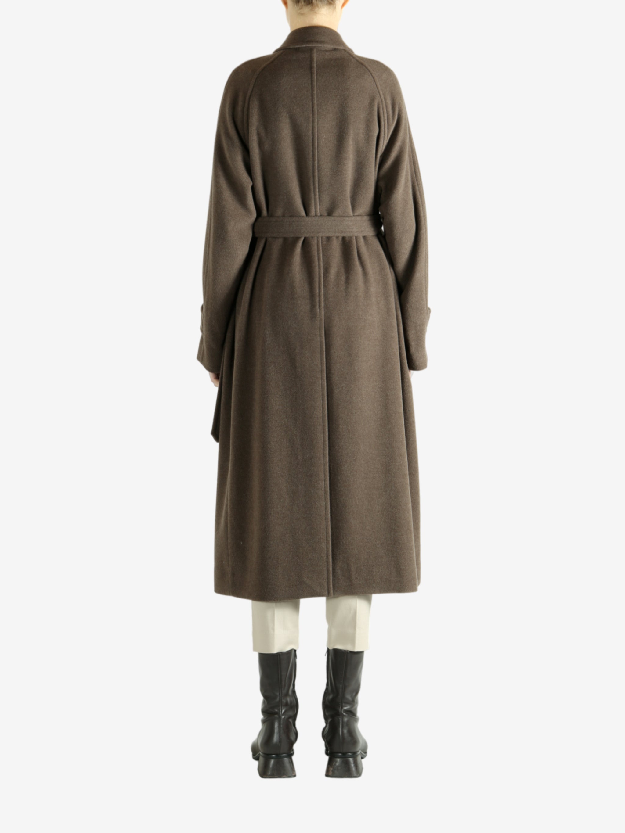 Brown coat worn by a person, showing the coat fit