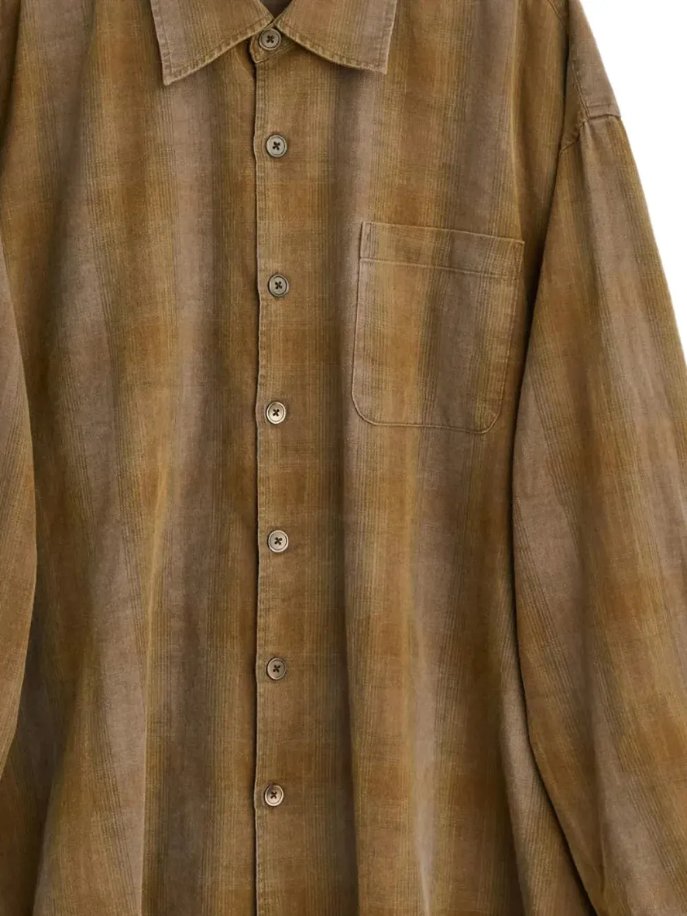 Close up of brown shirt, showing texture of the Cotton fabric
