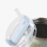 Close up of blue tumbler, showing texture of the stainless steel fabric