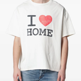 White t-shirt worn by a person, showing the t-shirt fit