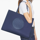 Blue bags worn by a person, showing the bags fit