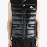 Black top worn by a person, showing the top's fit