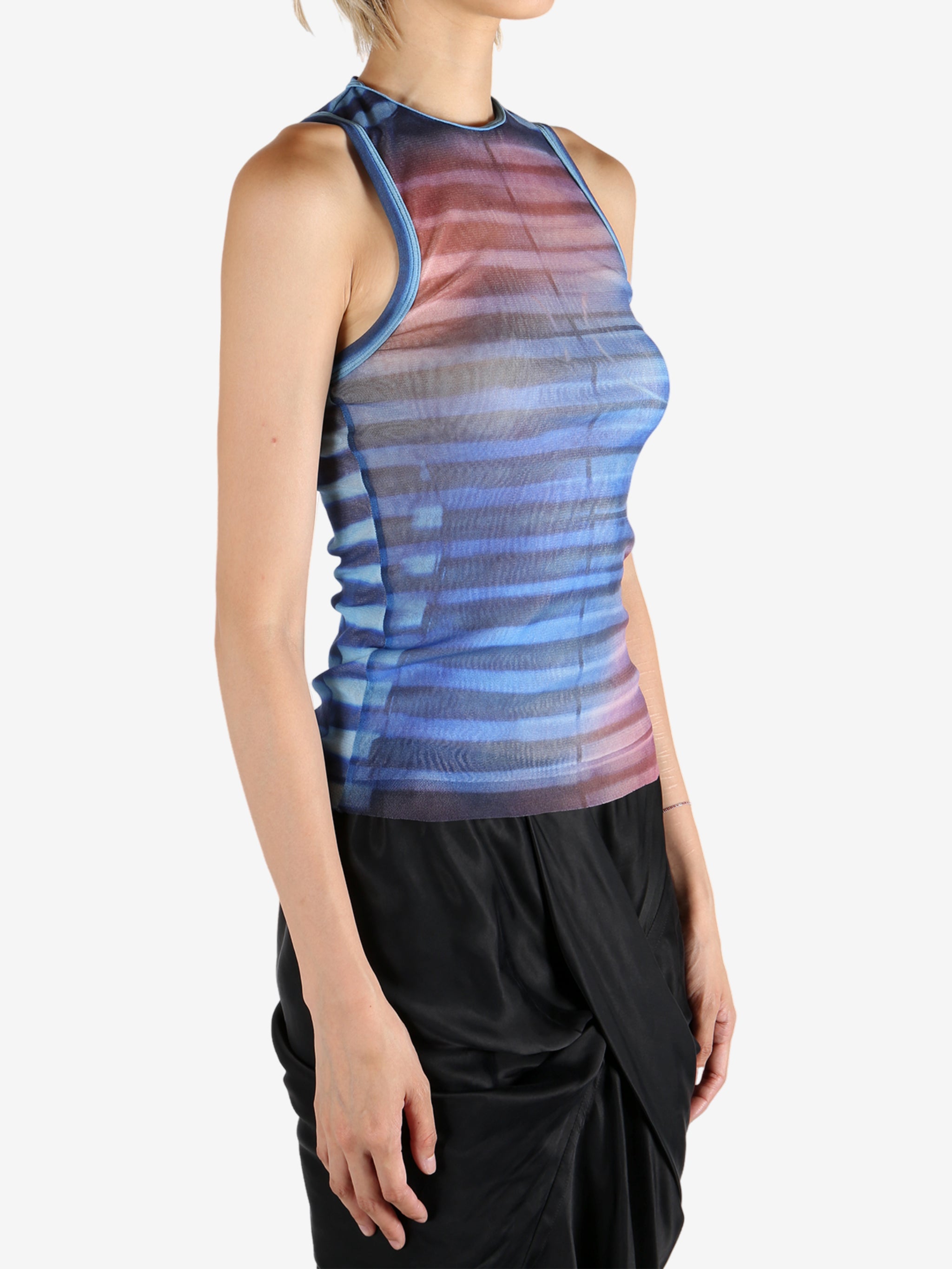 Blue top worn by a person, showing the top's fit