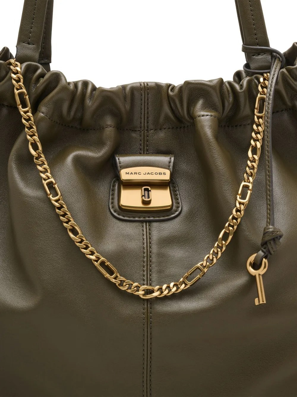 Close up of the green bag, showing texture of the leather fabric
